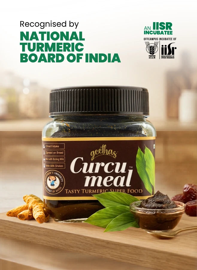 Jar of Geelhas Curcu meal with turmeric roots and leaves on a wooden surface, recognized by National Turmeric Board of India.